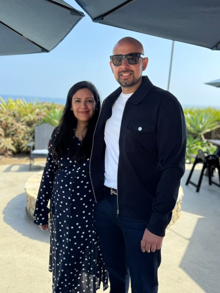Sobia and Omar outdoors during pregnancy